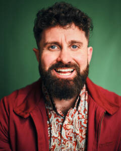 Rated one of the top 3 comedians in UK by Timeout magazine Joe Zalias is far from your average comedian. An ex-firefighter, ex-cage fighter, devoted father, film director, and published novelist, Joe brings a wealth of experience and a unique perspective to the stage. Over 18 years as a professional comedian, his rich and varied life has shaped his distinctive style, blending sharp wit with engaging storytelling. A regular headliner and MC at top comedy clubs across the UK and the international comedy circuit, Joe has cemented his reputation as one of the most dynamic and versatile performers in the industry.